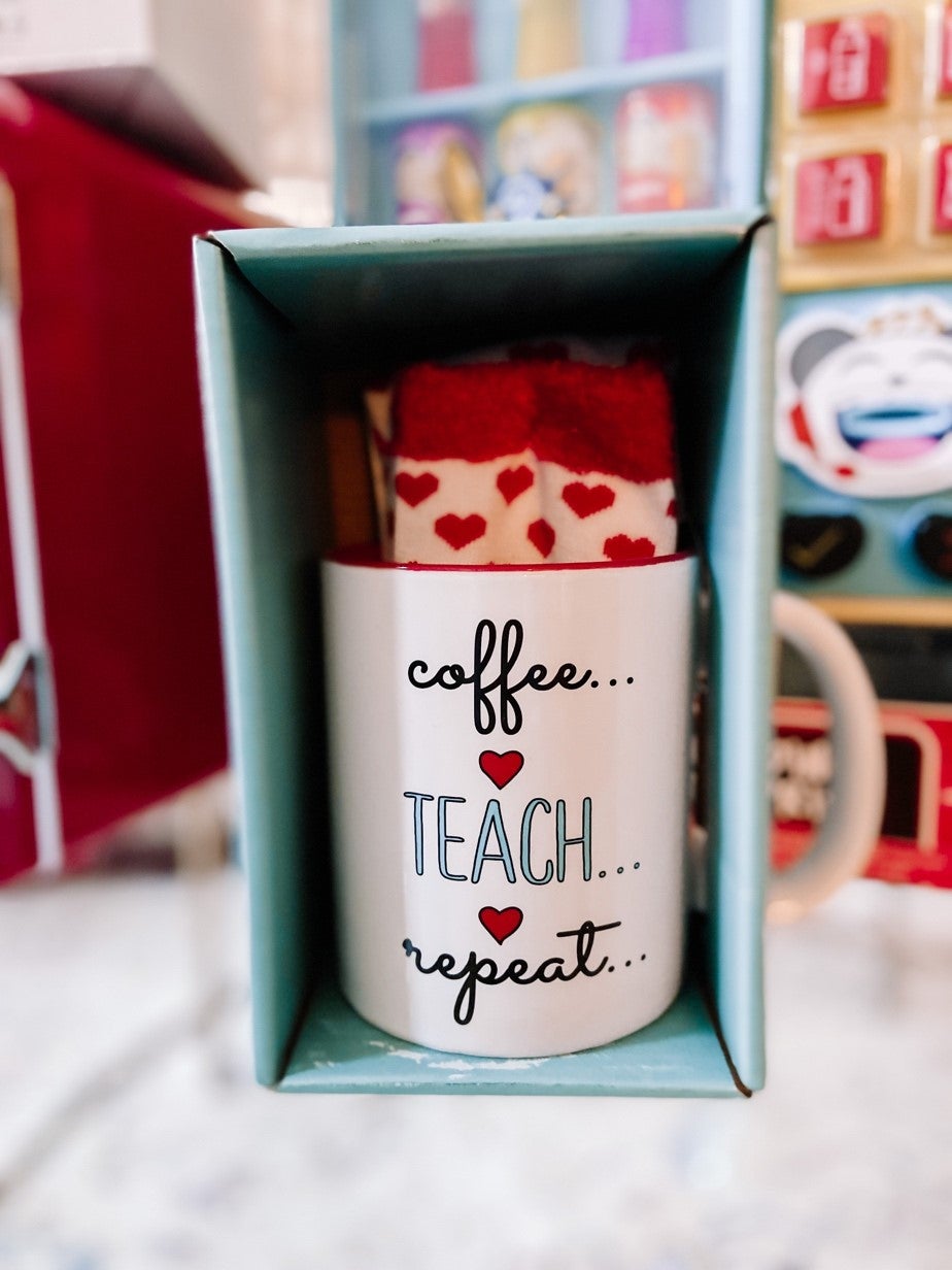 Gift mug for a teacher showing coffee teach repeat
